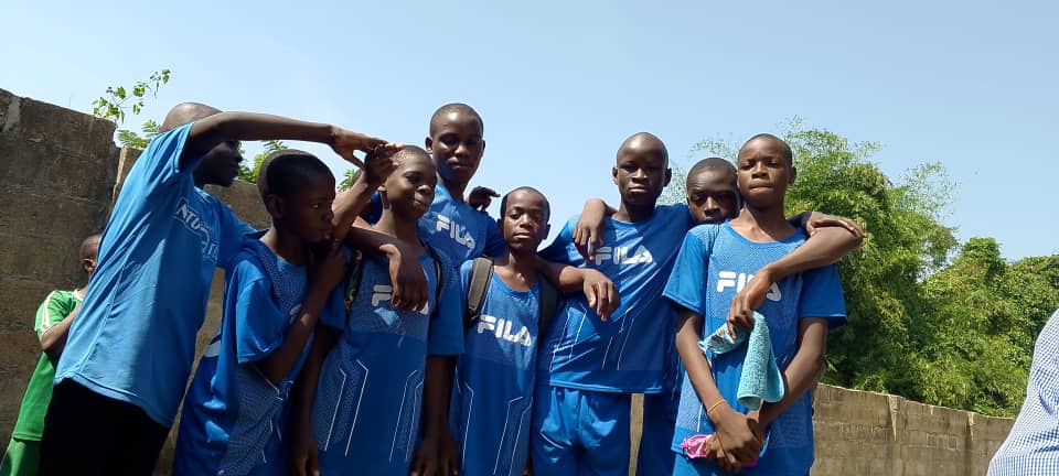 Boys football team group photo on field