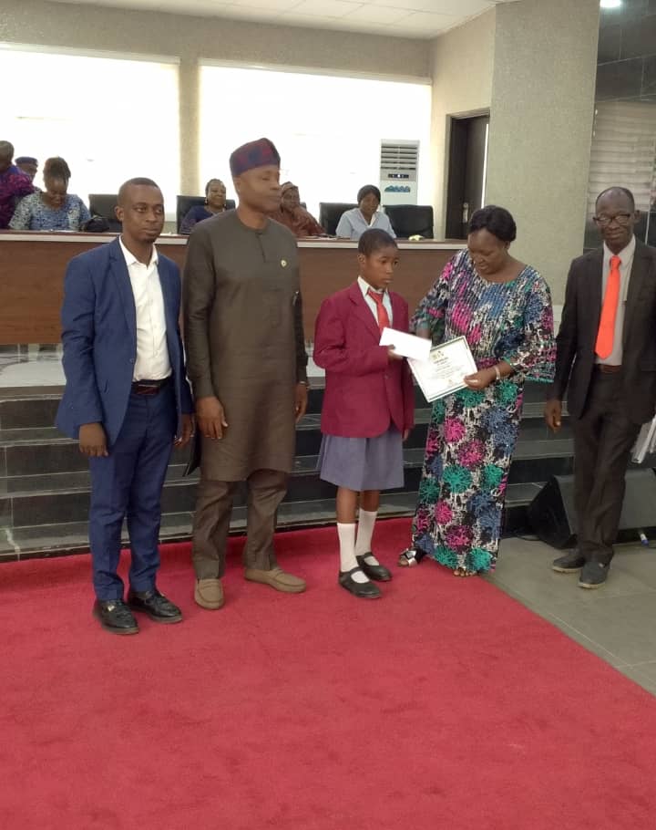 Award ceremony group photo with student recipient