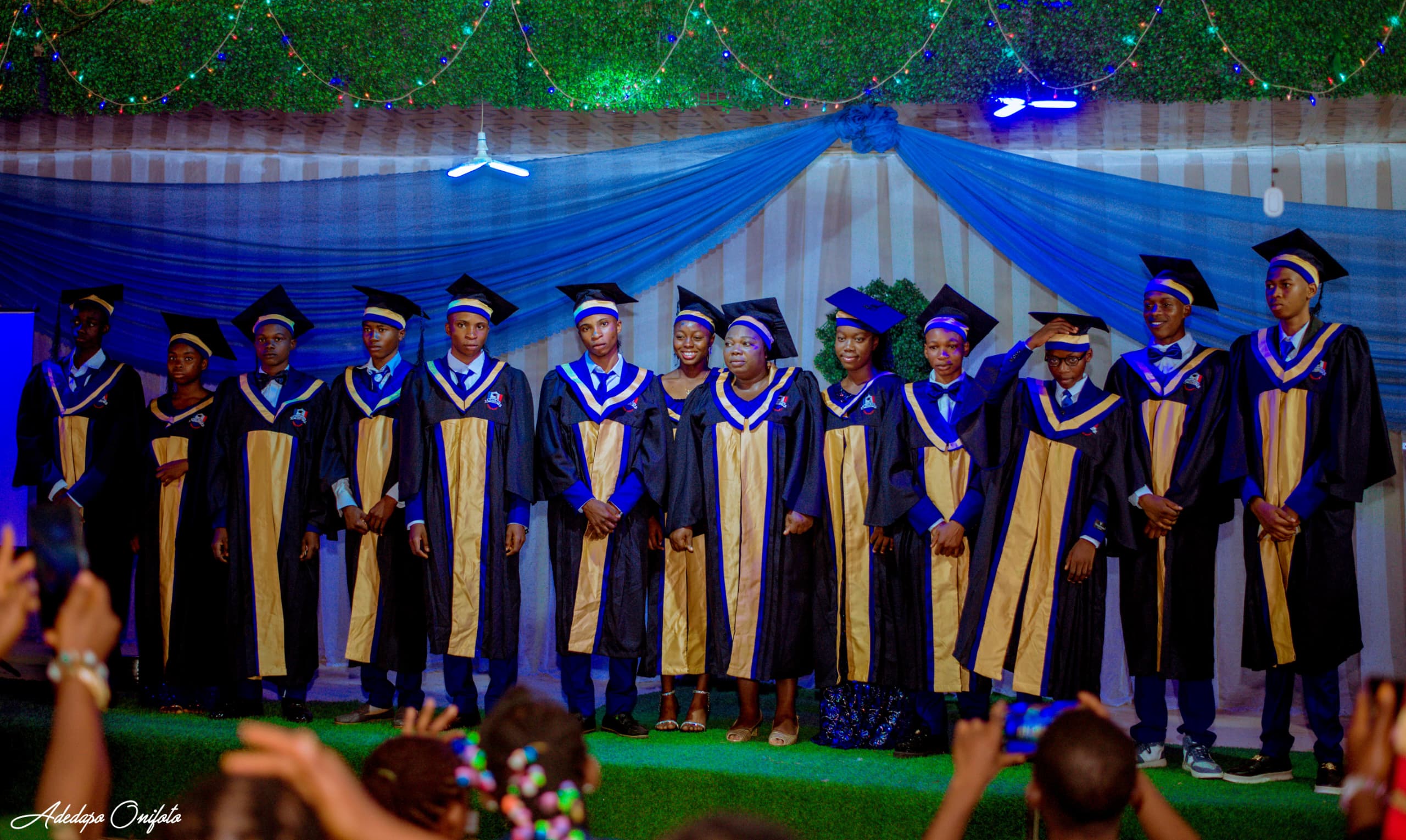 Graduating class group photo on stage