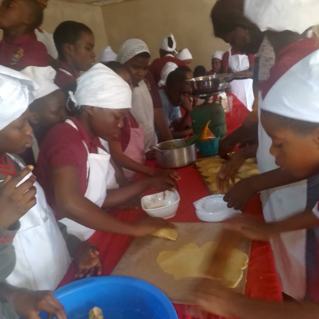 Home economics students preparing food practical